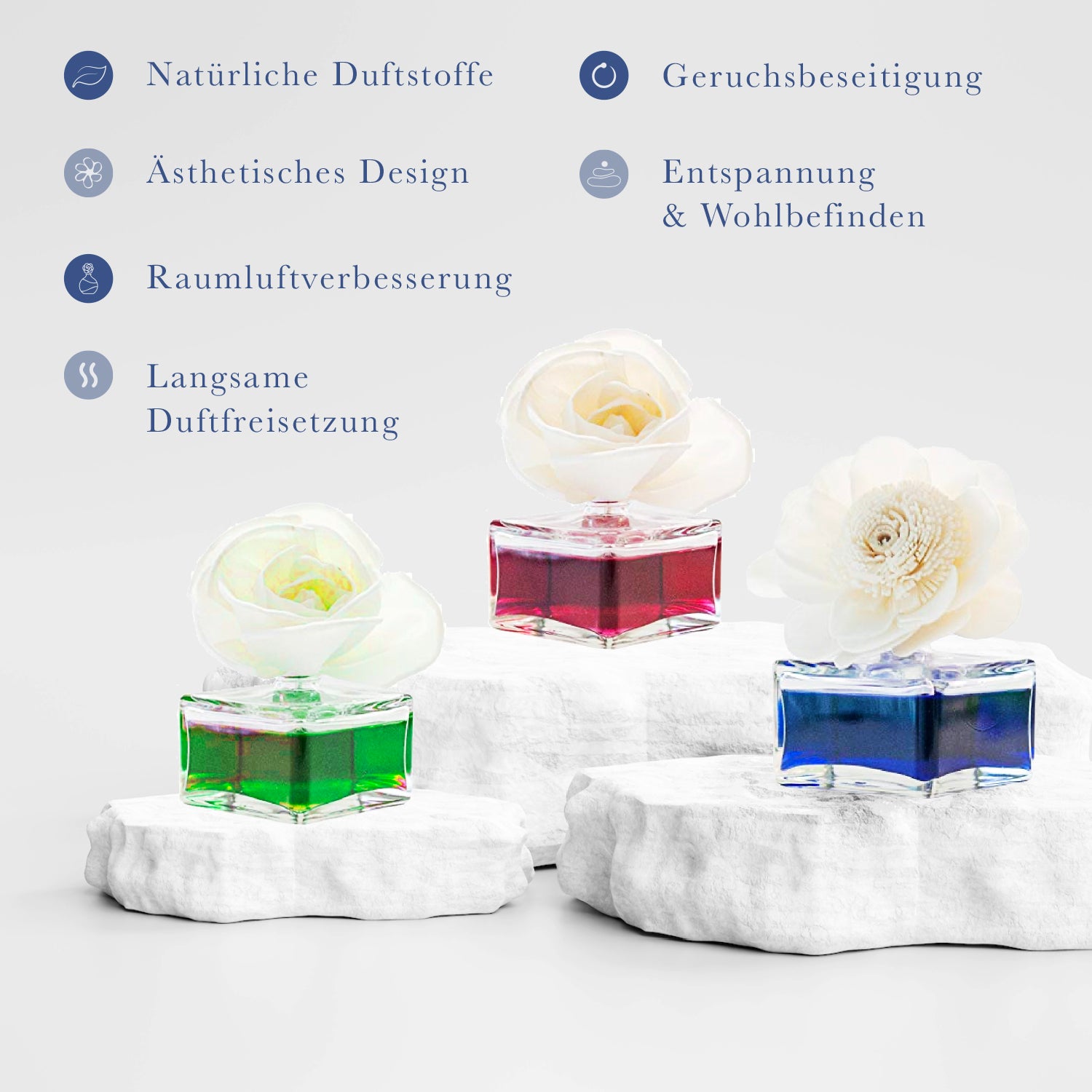 Drei magische duftblumen von CLENTAIRE aus der Verpackung und aufgebaut eine in grün eine in blau und eine in rot darüber Produktinformationen